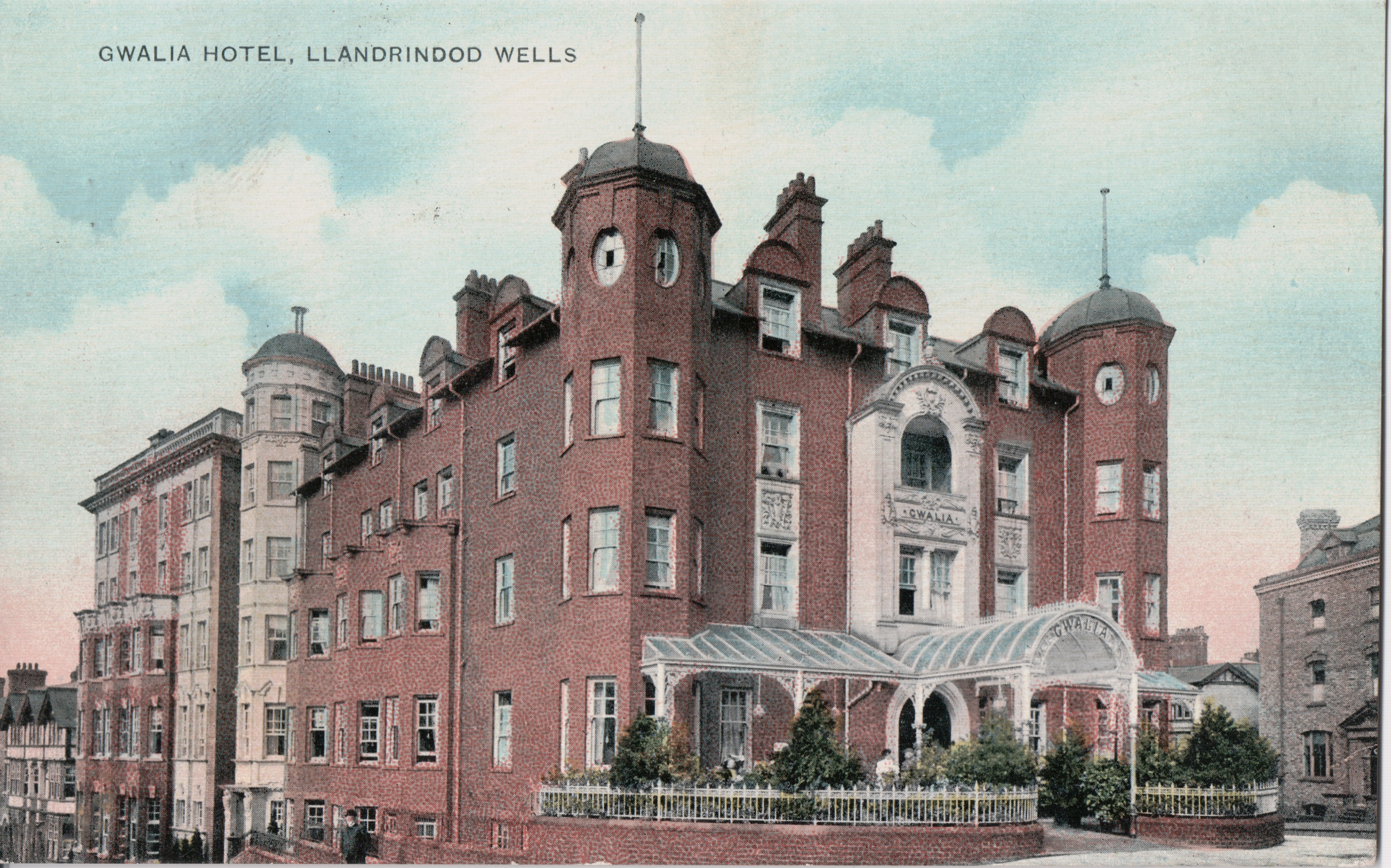 Historic postcard view of the purpose-built Gwalia Hotel in Llandrindod Wells, showing its principal frontage